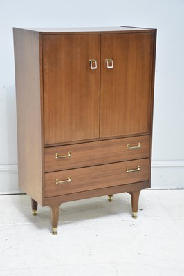 Lot 52 - E GOMME FOR G PLAN; a stained teak hallrobe,...