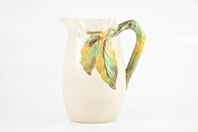 Lot 1435 - CLARICE CLIFF; a large ceramic jug with floral...
