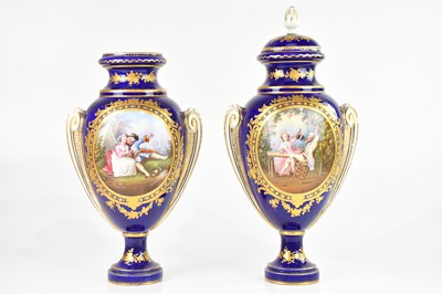 Lot 1869 - SÈVRES; a pair of early 20th century pedestal...