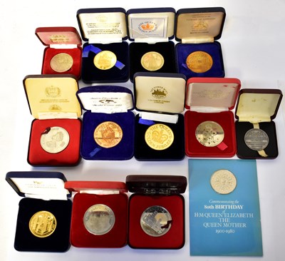 Lot 975 - Thirteen cased commemorative coins and medals,...