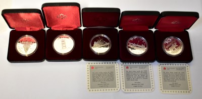 Lot 939 - ROYAL CANADIAN MINT; five silver dollars, two...