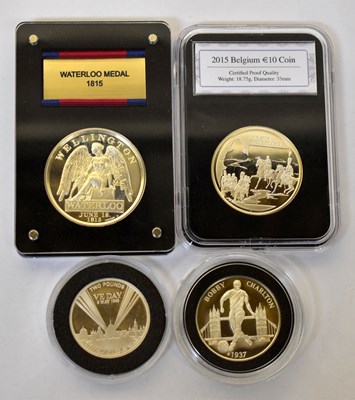 Lot 934 - Four silver-proof commemorative coins/medals,...