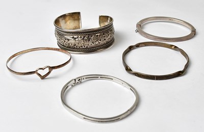 Lot 1068 - Five 925 silver bangles, comprising an example...
