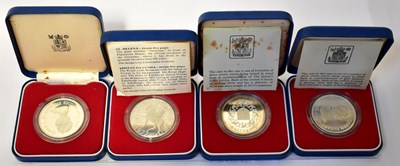 Lot 912 - ROYAL MINT; four silver-proof coins...