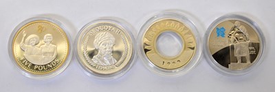 Lot 933 - Four silver-proof coins, to include two...