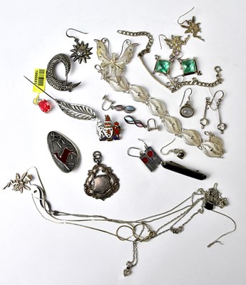 Lot 1135 - A group of silver jewellery, to include a...
