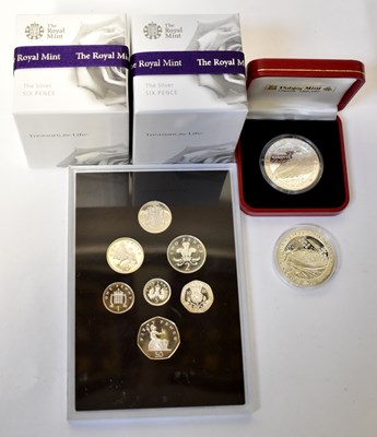 Lot 907 - A collection of silver coins, to include two...