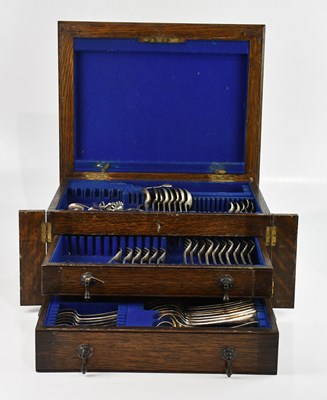 Lot 1448 - An oak canteen containing assorted silver...