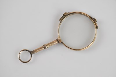 Lot 226 - A pair of yellow metal folding lorgnettes with...