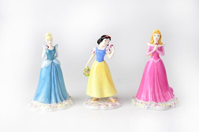Lot 449 - ROYAL DOULTON; three Walt Disney Showcase...