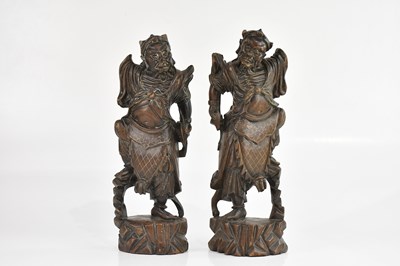 Lot 1634 - A pair of Chinese rootwood figures with white...
