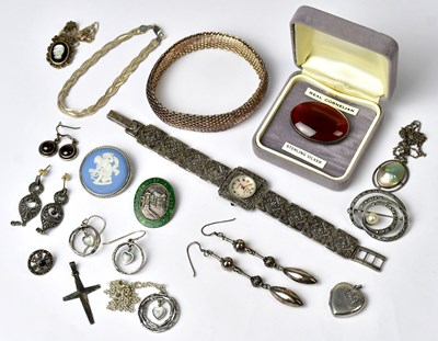 Lot 1141 - A group of silver jewellery, to include a...