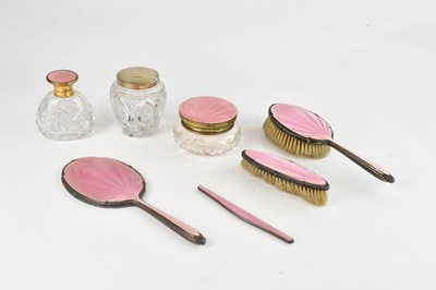 Lot 1142 - An Art Deco enamel six piece dressing table...