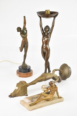 Lot 1399 - An Art Deco bronze wall mounted figural table...