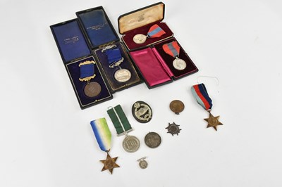 Lot 1269 - A collection of medals comprising a George VI...