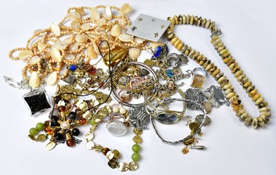 Lot 1150 - A group of costume jewellery, to include a six-...