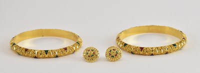 Lot 1046 - A pair of 22ct bright gold and enamel...