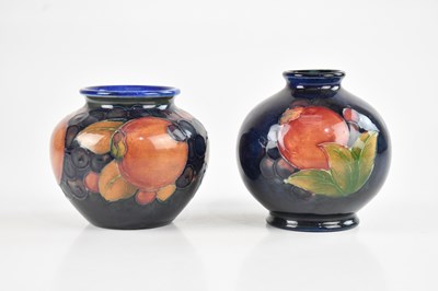 Lot 42 - WILLIAM MOORCROFT; two small squat vases in...