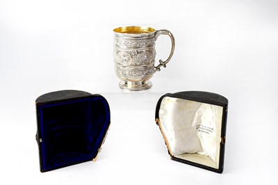 Lot 911 - A Victorian hallmarked silver cup decorated...