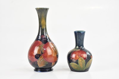 Lot 43 - WILLIAM MOORCROFT; a baluster shaped vase in...