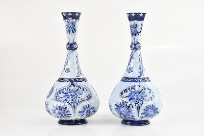 Lot 4 - WILLIAM MOORCROFT; a pair of Florian ware...