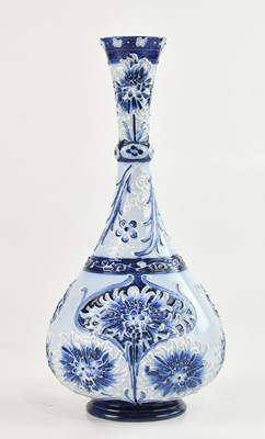 Lot 13 - WILLIAM MOORCROFT; a Florian ware bottle vase...