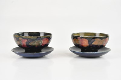 Lot 45 - WILLIAM MOORCROFT; two footed sundae bowls in...