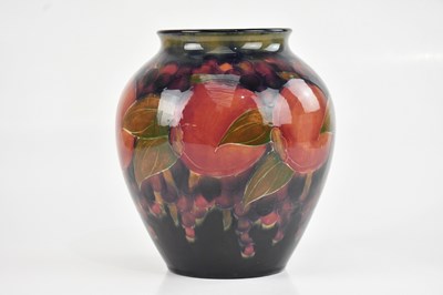 Lot 23 - WILLIAM MOORCROFT; a large ovoid form vase in...