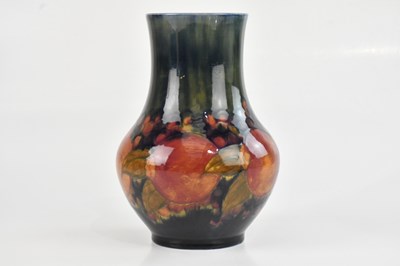 Lot 27 - WILLIAM MOORCROFT; an early baluster shaped...