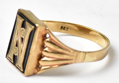 Lot 1028 - A 9ct yellow gold gentlemen's memorial ring...