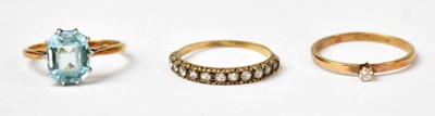 Lot 1029 - Three 9ct yellow gold rings, comprising a half...
