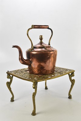 Lot 1192 - A copper kettle and a brass trivet with tile...