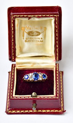 Lot 1024 - A 9ct yellow gold ring set with three oval...
