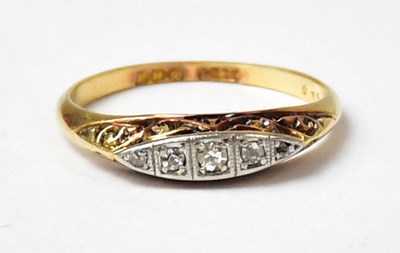 Lot 1012 - An 18ct yellow gold ring set with five...