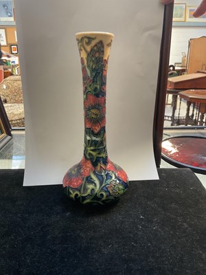 Lot 113 - MOORCROFT; a 'Pomegrante' pattern vase of...