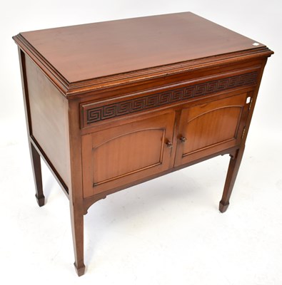 Lot 645 - A gramophone in a mahogany cabinet with...
