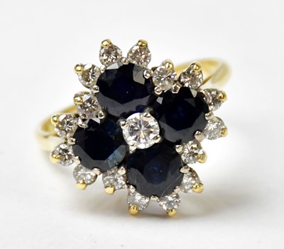 Lot 1006 - An 18ct yellow gold sapphire and diamond...