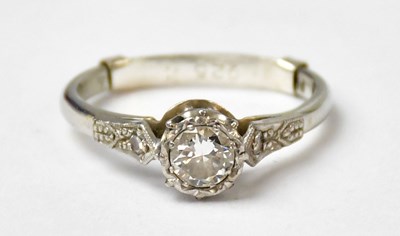 Lot 995 - A 18ct white gold diamond ring, the central...