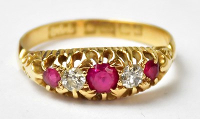 Lot 1010 - An 18ct yellow gold ring, alternately set with...