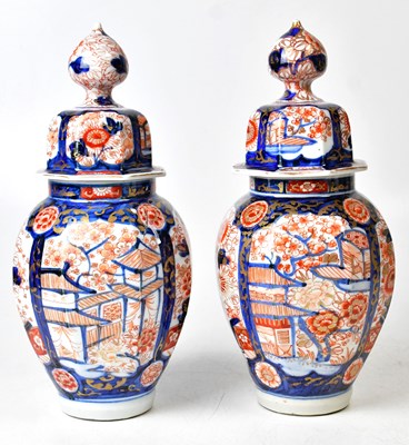Lot 196 - A pair of Japanese Imari octagonal form lidded...