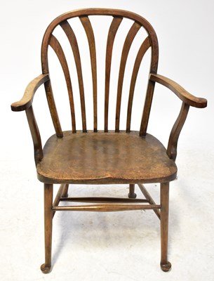 Lot 81 - A 19th century stick back open armchair on...