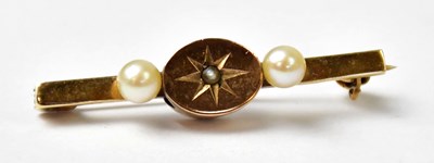 Lot 1070 - A 14ct yellow gold bar brooch set with a...