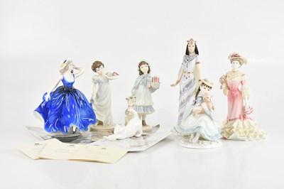Lot 1747 - COALPORT; a collection of seven figures...