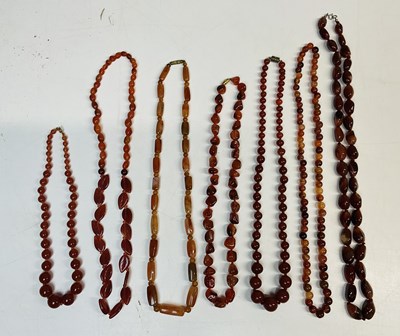 Lot 783 - Seven carnelian bead necklaces.