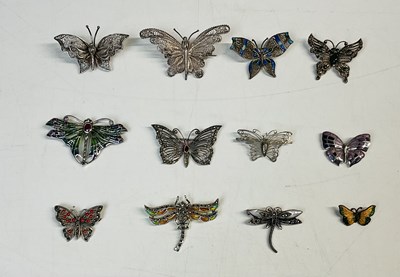 Lot 660 - Twelve butterfly and dragonfly brooches...