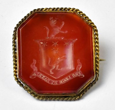 Lot 1077 - A Georgian octagonal carnelian seal with crest,...