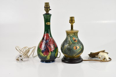 Lot 1414 - MOORCROFT; a baluster shaped table lamp in the...