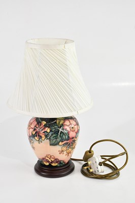Lot 1415 - MOORCROFT; a bulbous table lamp in the 'Oberon'...