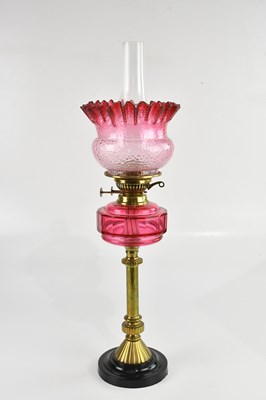 Lot 2039 - A late 19th century brass oil lamp, with...