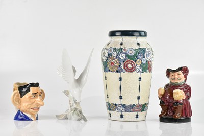 Lot 1746 - LLADRÓ; a model of a bird perching, height...